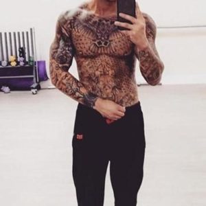 Ellis Lacy tattoo chest selfie
